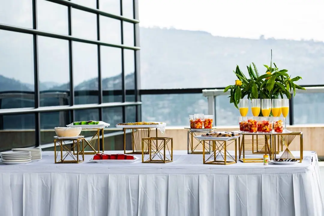 Rooftop catering prepared for an evening gathering in Kigali